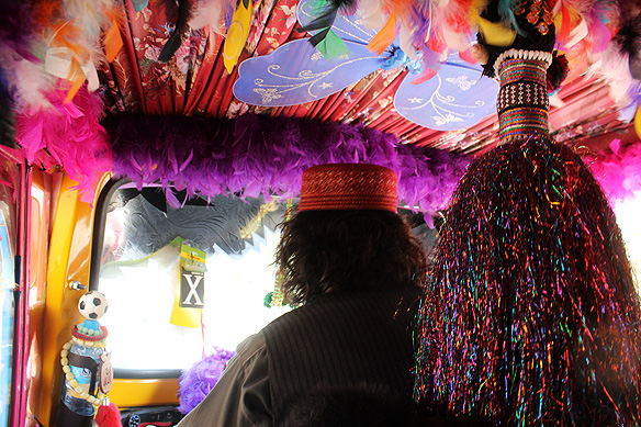 Colourful tuk-tuks and tuk-tuk drivers in Herat.