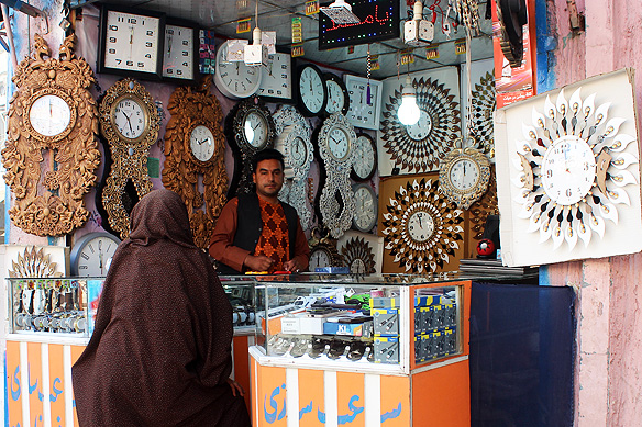 Just another wall-clock shop in a market in Afghanistan.
