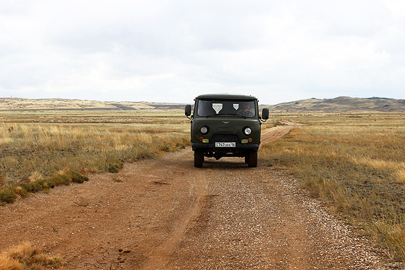 Soviet remnants: Kazakh guards at the Polygon in a UAZ-452. The four-wheel off-road van was originally designed for USSR's military.