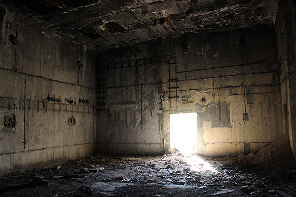 A notice on the wall inside the Command Centre [above the door] reads, "Pass to the security before leaving."