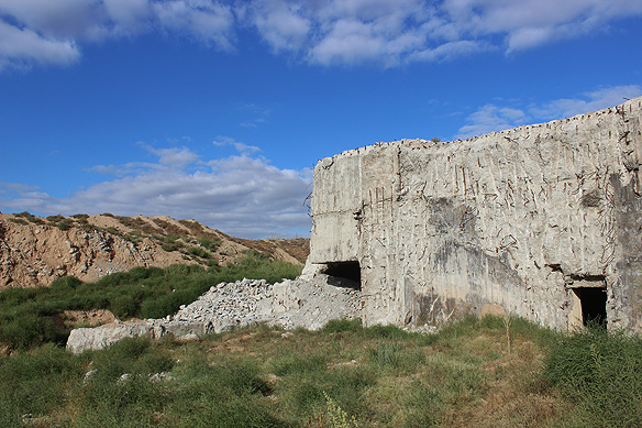 Semipalatinsk Nuclear Test Site's Command Centre coordinated the activities of all eight test districts. When the site was disbanded in 1991, its closure included blasting of its buildings. What was left was scavenged by looters in the subsequent years.