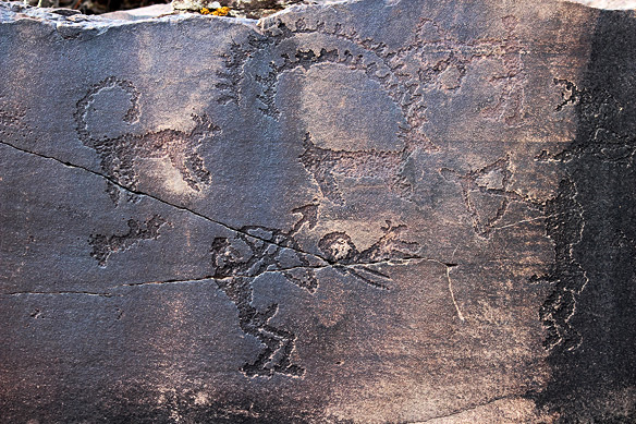 A Bronze Age collage. Notice the two men with bows and arrows, domesticated dogs, and creature with fantastical horns!