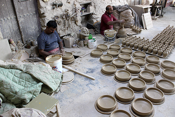 Jaffer Mohd. Al-Shughul Pottery Workshop in A'ali village produces pottery using millennia-old techniques.