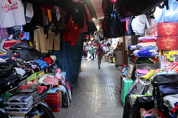 Shopping lane inside the Bab Al-Bahrain Souq aka Old Manama Souq.