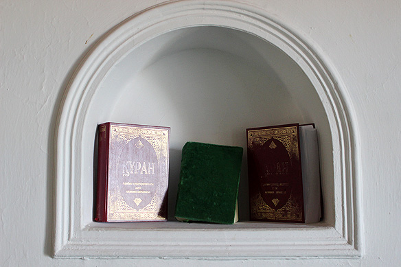 Copies of the Quran translated into the Kazakh language.