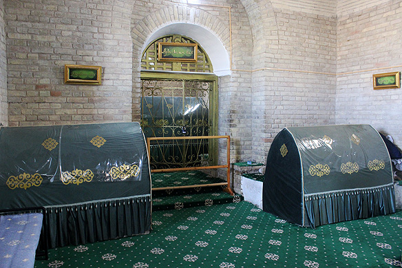 Tombstones of Arystan Bab [behind the screen] and three of his students.