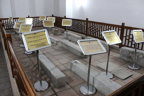 Gravestones of Kazakh Khans in the palace section of the mausoleum. From the 15th to 18th Century the Kazakh Khans used the mausoleum as their residence.