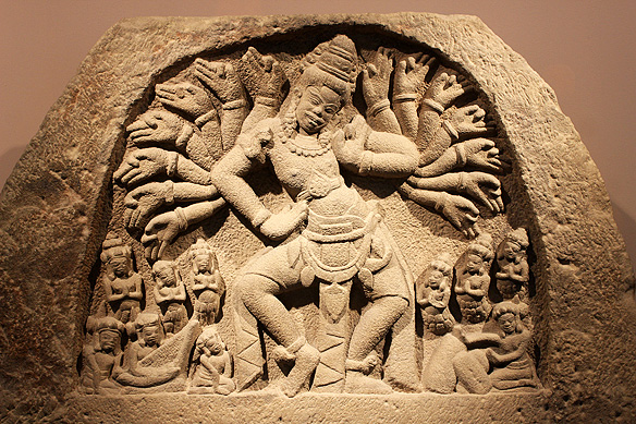 Dancing Shiva symbolizing the cyclical nature of the universe—creation, preservation, and destruction, 10th Century, Sandstone, Phong Le.