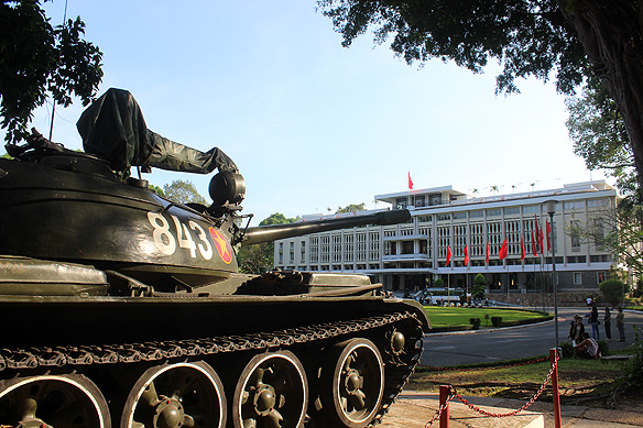 The communist tank which crashed through the gates of Independence Palace on 30 April, 1975, signalling the fall of Saigon and the country’s reunification. Behind it is the Independence Palace, later renamed Reunification Hall.