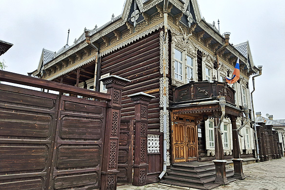 One of the very many Lace Houses in Irkutsk's historical city-centre decorated with filigree woodwork around the roof and on the corner junctions.