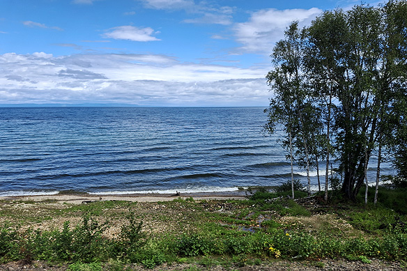My train skims around Lake Baikal, the world's deepest and oldest freshwater lake, on its way to Russia's Far East.