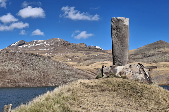 An ancient Vishapakar, the precursor to the khachkar, at Lake Kari on Mount Aragats.