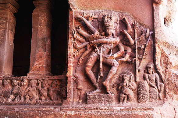 One of Badami Cave Temples' most impressive sculptures: Shiva as the 18-armed Nataraja doing the Tandava Nritya—the cosmic dance of creation, preservation, and destruction.