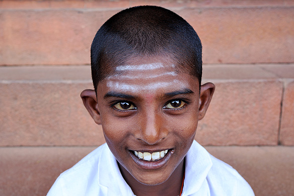 He wanted a serious portrait. I wanted him to smile. :)