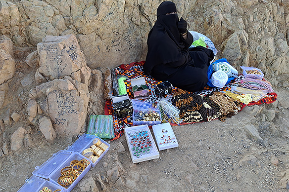Hawker selling talismans on Archers' Hill.