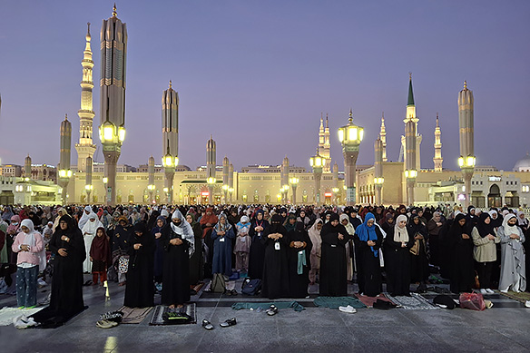 Maghrib [sunset prayer] at the Prophet's Mosque, ladies' section. The mosque can accommodate up to 1.5 million worshippers at a given time.