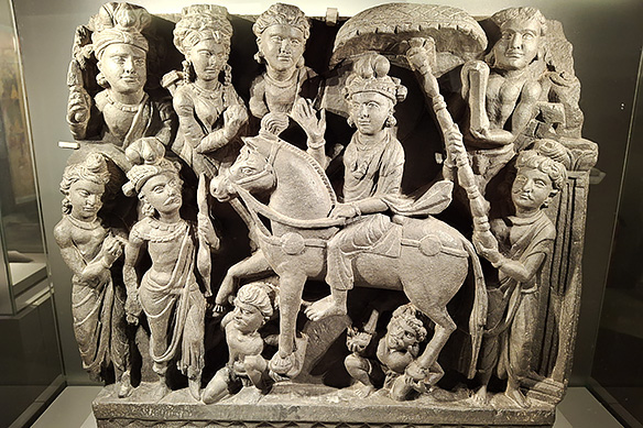 The Great Departure shows Prince Siddhartha leaving his palace on his horse Kanthaka to seek enlightenment. 2nd Century CE, Loriyan Tangai [North-West part of Undivided India].