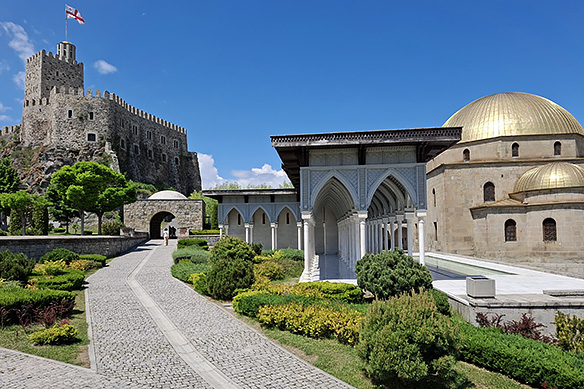 Rabati Castle comprises an upper Medieval Georgian citadel and a lower section with an Ottoman mosque and Georgian Orthodox church amidst pools and gardens.